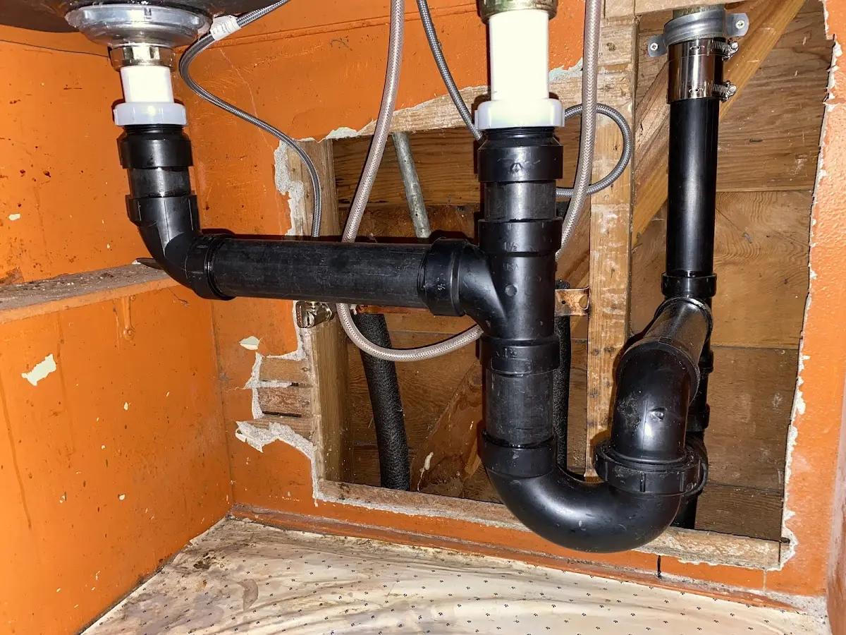 Professional Garbage Disposal Repair equipment and tools on the job in Cloquet